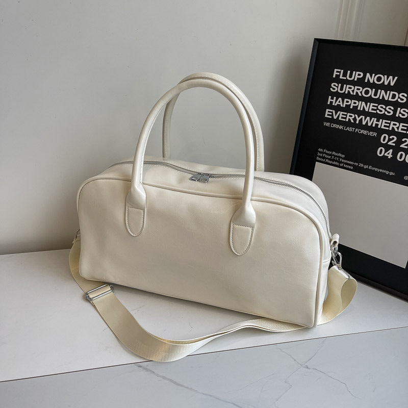 Elegant and Spacious Weekend Bag Made of High-Quality Synthetic Leather Bowlift