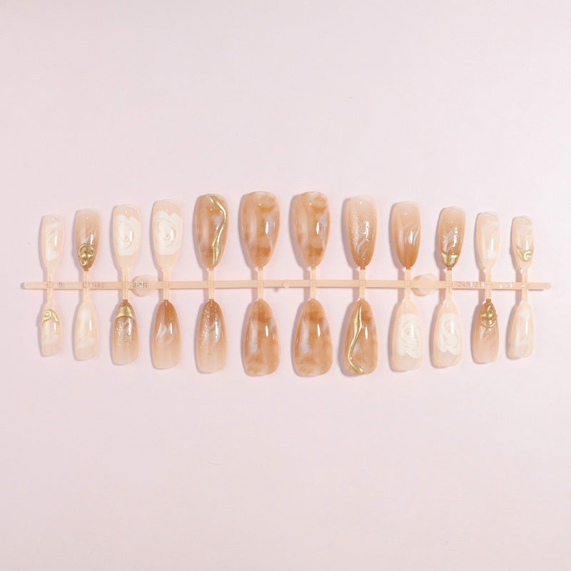 Artistic Press-On Nail Set with Gold and Floral Accents Bowlift