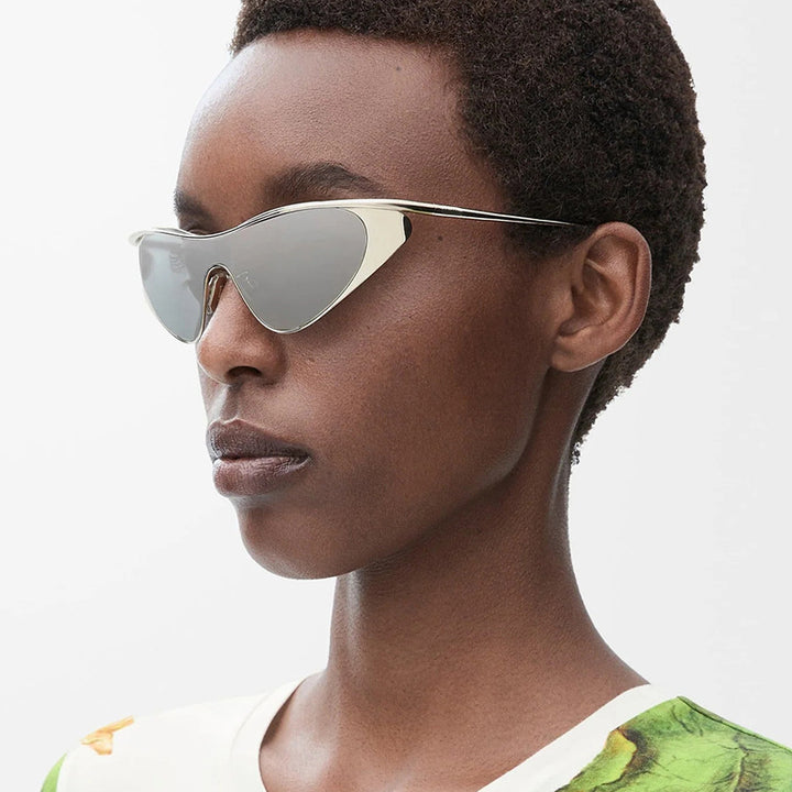 Ladies extravagant shaped sunglasses with protective UV filter Bowlift