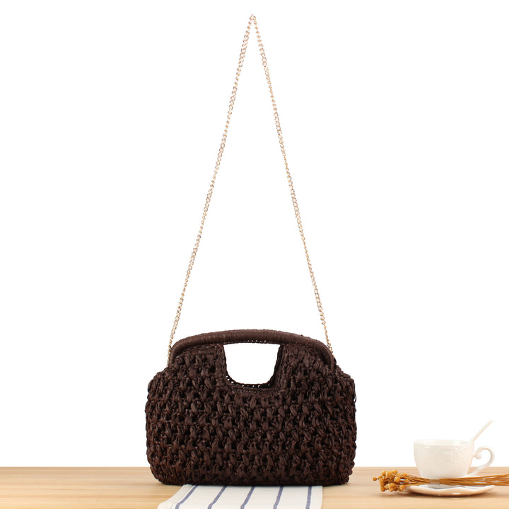 Fine straw shoulder bag with elegant chain accents Bowlift