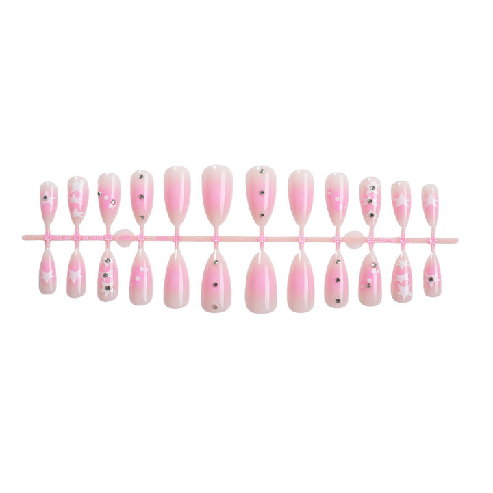 Artificial nail set with sparkling rhinestone accents and playful star motifs Bowlift