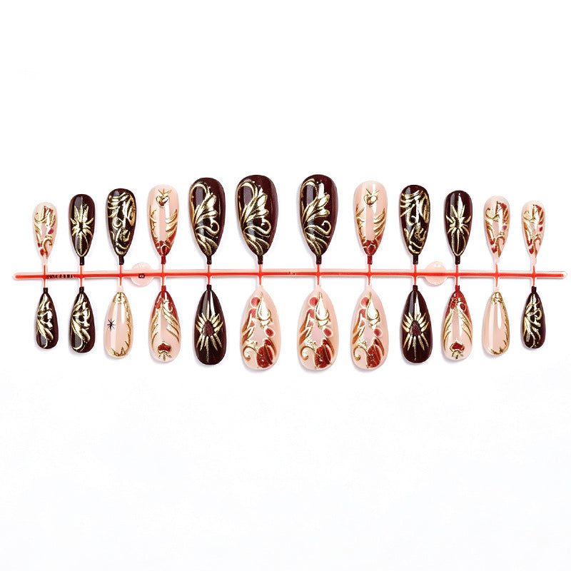 Decorative Press-On Nail Art Set with Intricate Gold Floral Design Bowlift