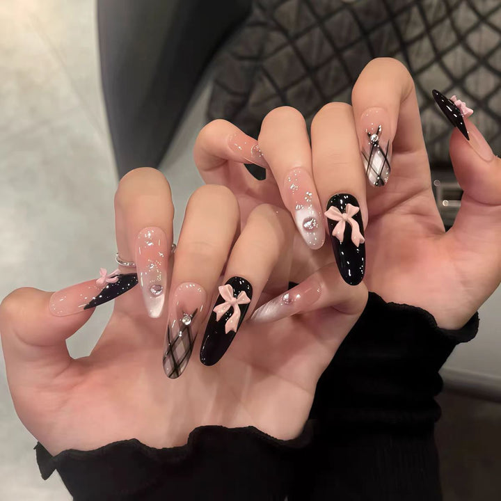Artificial nails with glamorous rhinestone decorations Bowlift
