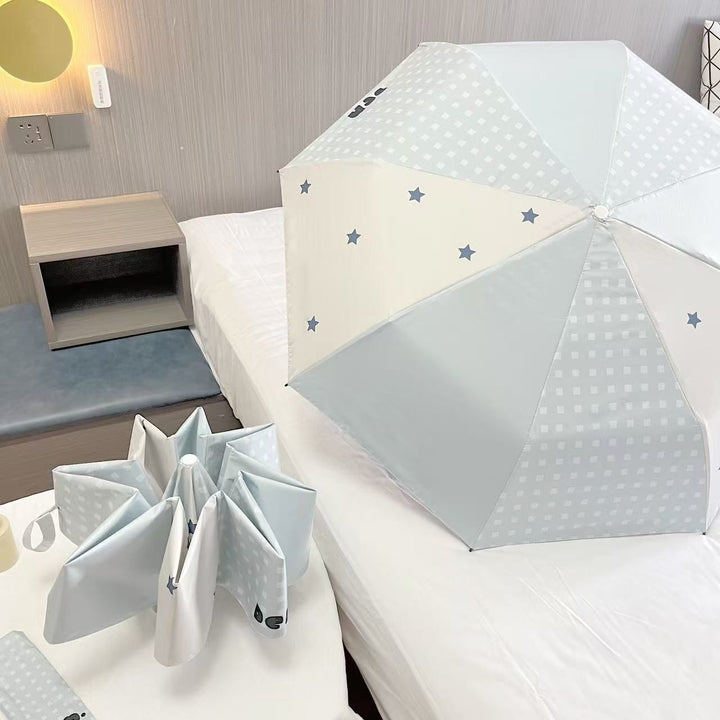 Women's folding umbrella with unique star pattern and practical carrying bag Bowlift