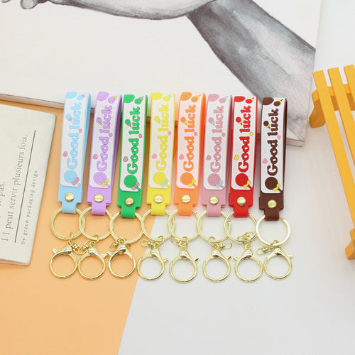 Unisex keychain with motivating lucky saying Bowlift