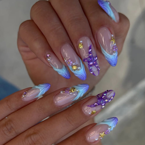 Artificial nails with maritime motifs and glitter accents Bowlift