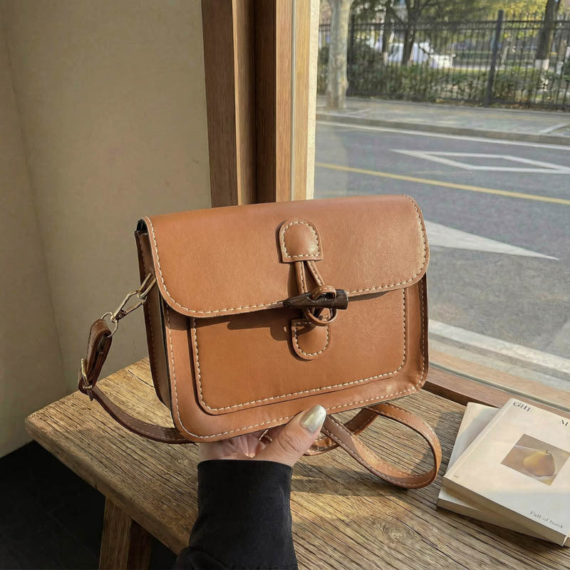 WoStructured Leather Crossbody Bag Bowlift