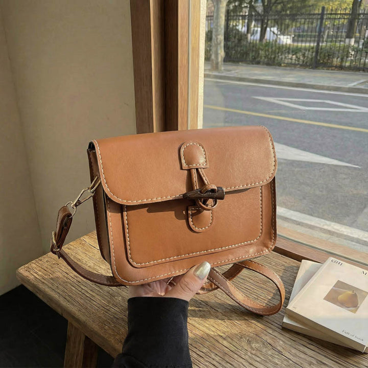 WoStructured Leather Crossbody Bag Bowlift
