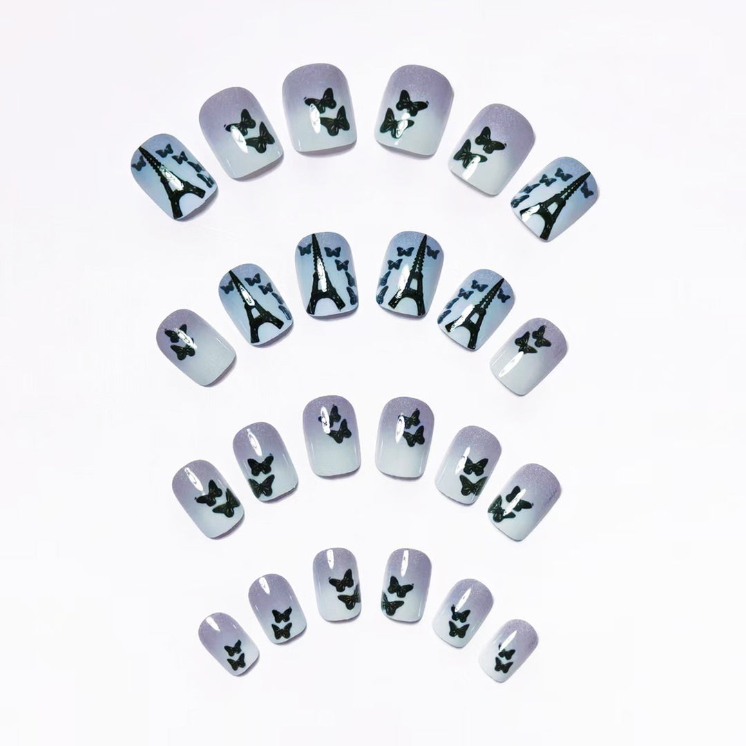 Artificial nails with Paris motif and butterflies Bowlift