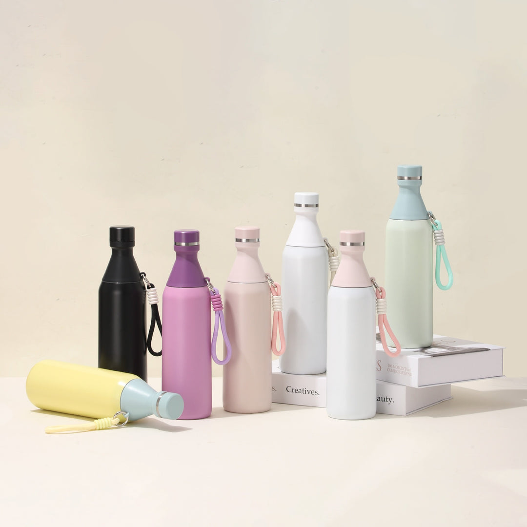 Women's insulated water bottle with practical carrying strap Bowlift