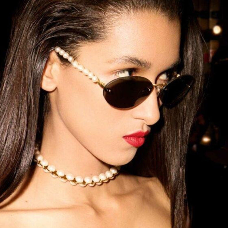 Women's stylish oval sunglasses with elegant embellishments Bowlift