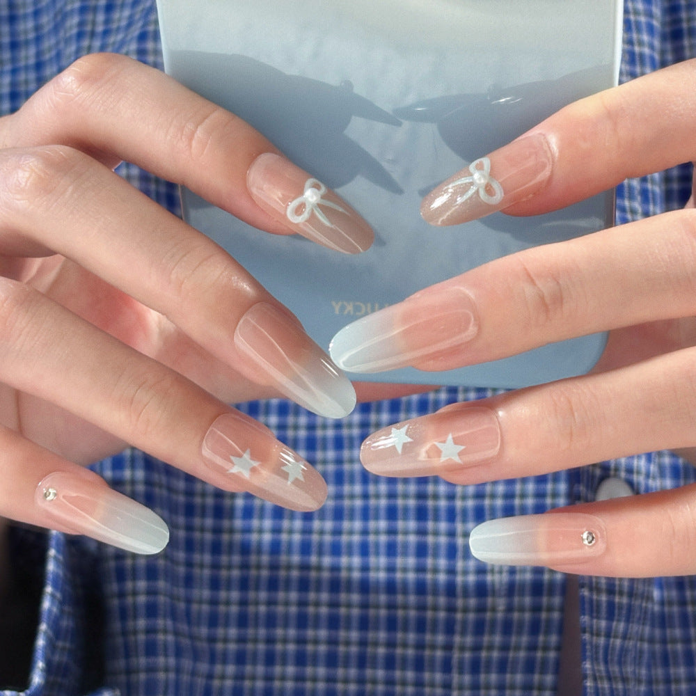 Artificial nails with elegant ombre effect and decorative accents Bowlift