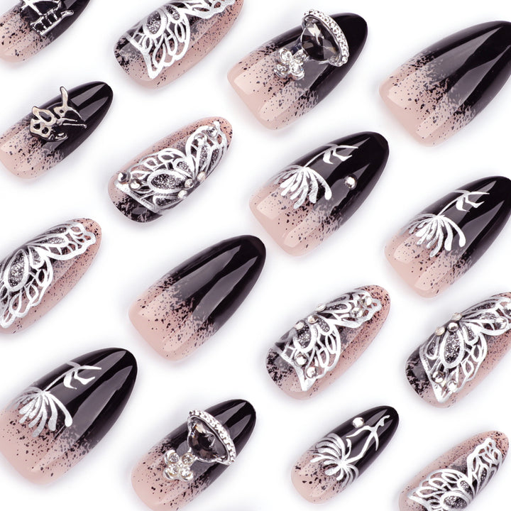 Artful stiletto nails with delicate embellishments and glamour accents Bowlift