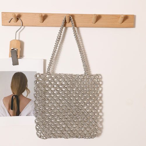 Sparkling Net Handbag Made of Braided Material Bowlift