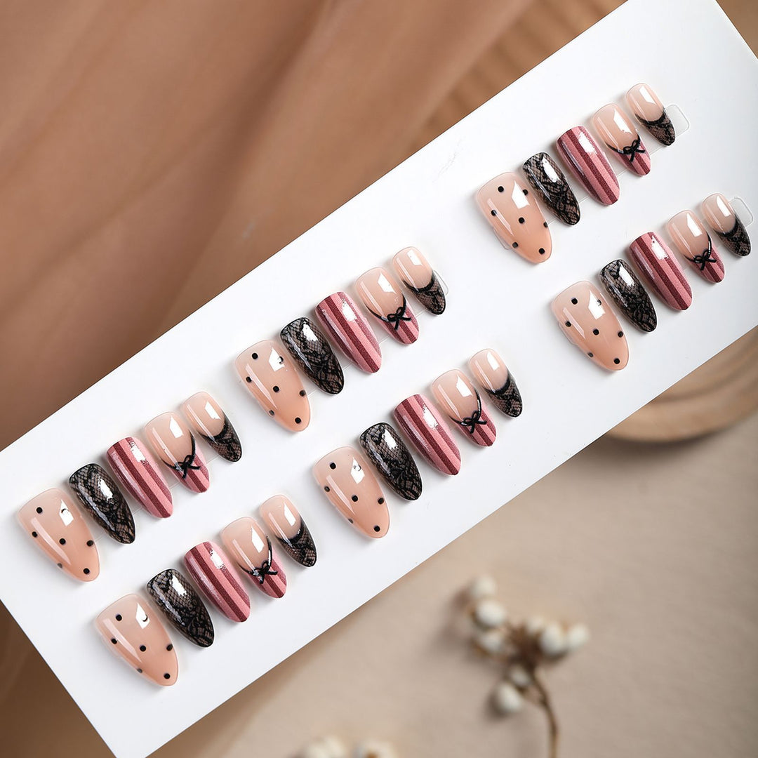 Acrylic nail set with elegant bow and lace accents Bowlift