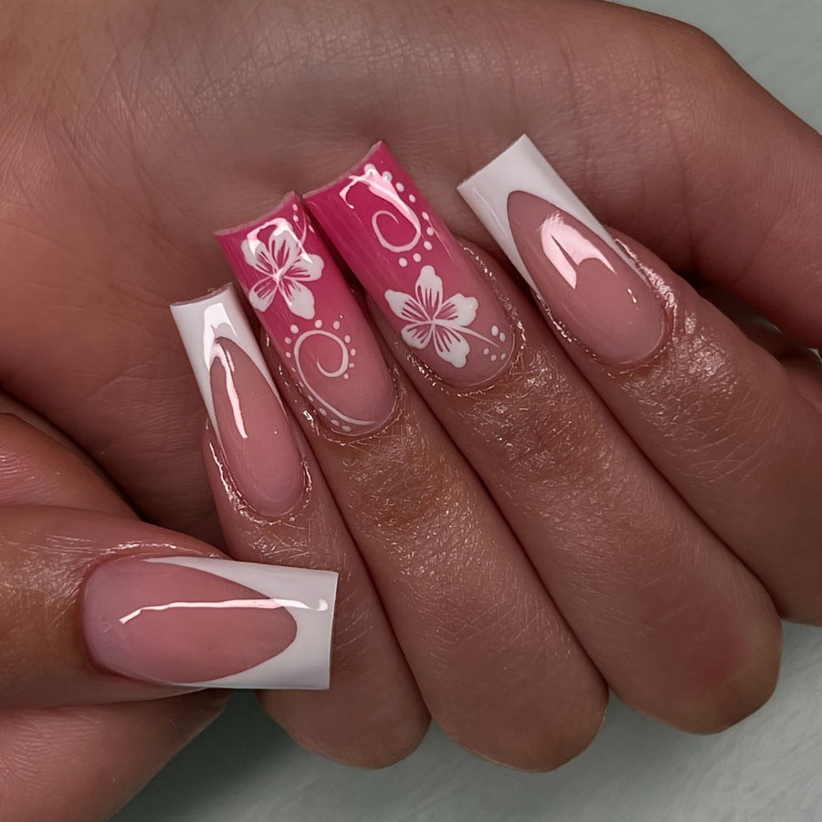 Artificial nails with floral accents and shine Bowlift
