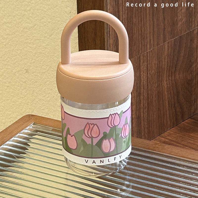Women's insulated drinking bottle with ergonomic carrying handle and elegant flower design Bowlift