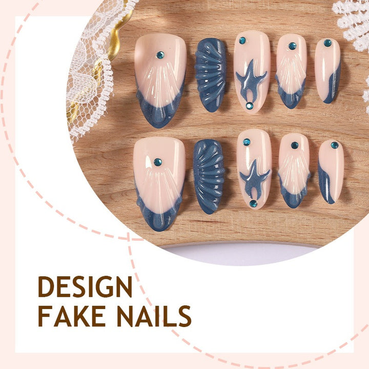 Artificial nail set with maritime shell and star motif Bowlift