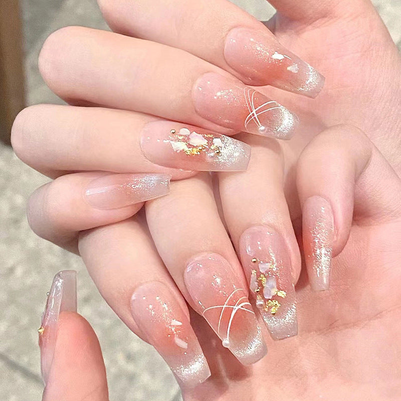 Artificial nail set with elegant glitter and flower decorations Bowlift