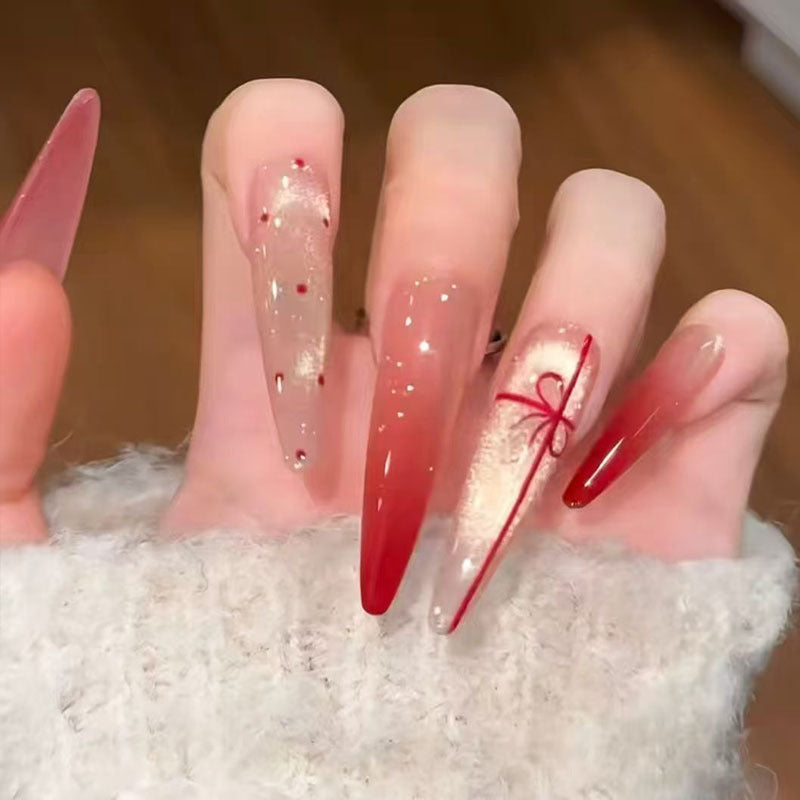 Artistic Long Stiletto Nail Enhancements Bowlift
