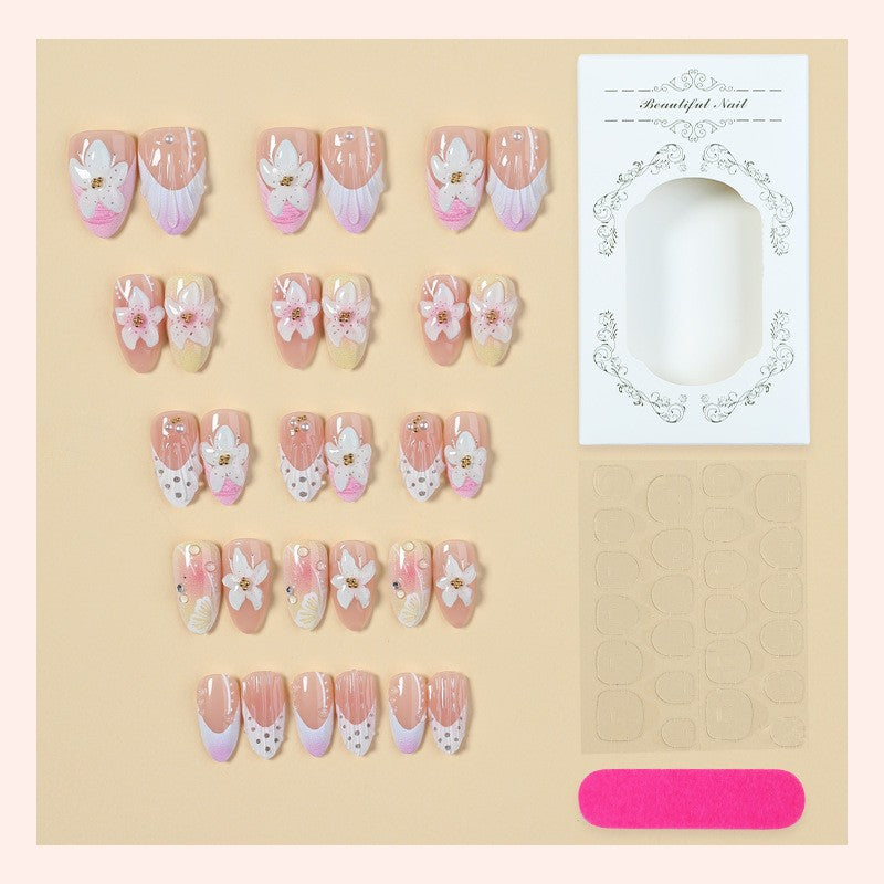 Nail art set with elegant floral design and glitter accents Bowlift