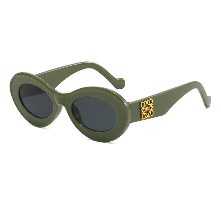 Women's fashionable sunglasses with oval frame and golden applications Bowlift