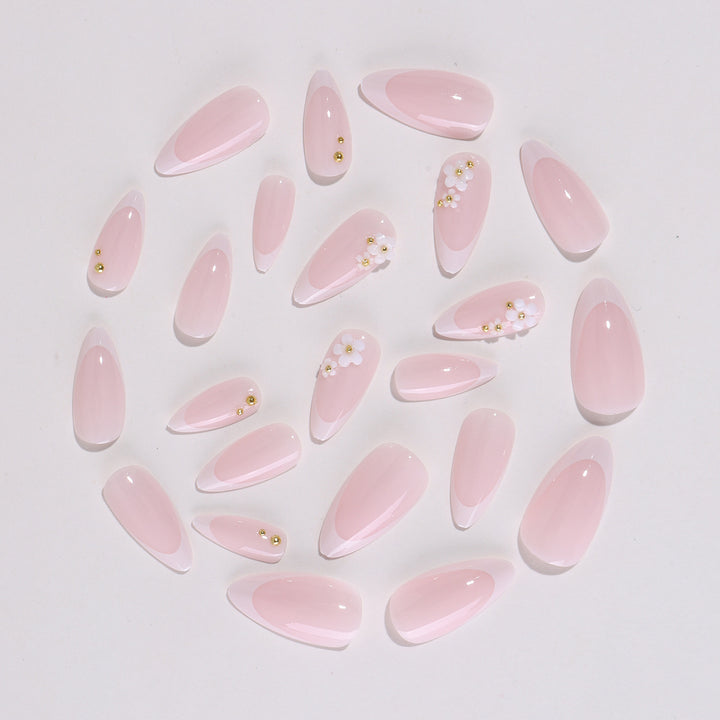 Artificial nail set with elegant floral accents and glitter Bowlift