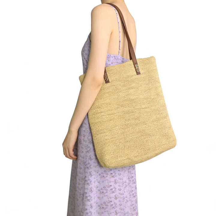 Handbag Made of Sustainably Woven Natural Material with Elegant Leather Handles Bowlift