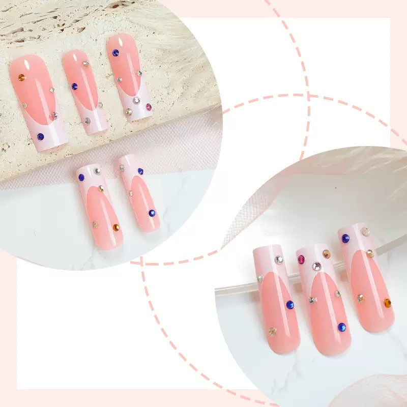 Artificial nails with sparkling rhinestone accents Bowlift