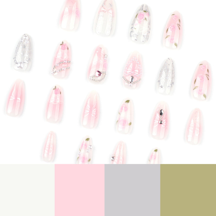 Artistic nail extensions with elegant flower decoration Bowlift