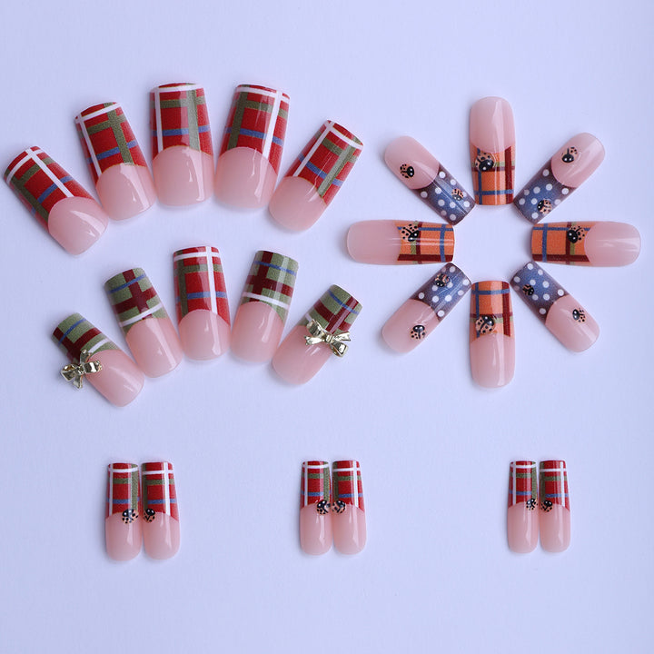Artificial nails with unique plaid pattern and 3D applications Bowlift