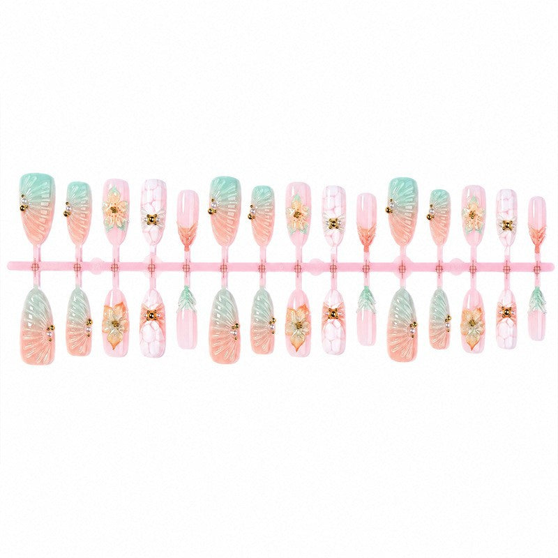 Artificial nail set with glamorous flower and glitter details Bowlift