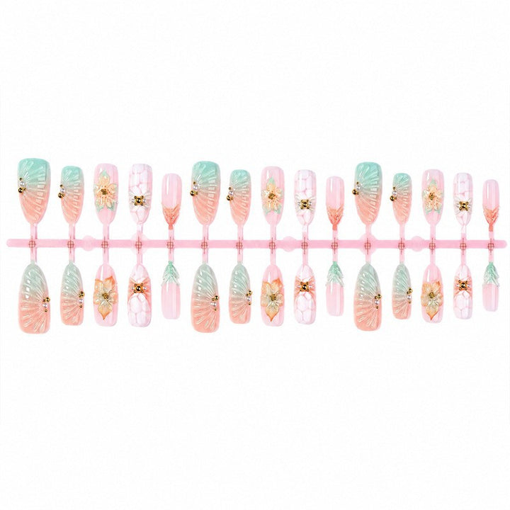 Artificial nail set with glamorous flower and glitter details Bowlift