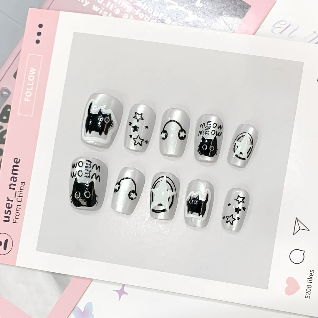 Playful nail art with cat motifs Bowlift