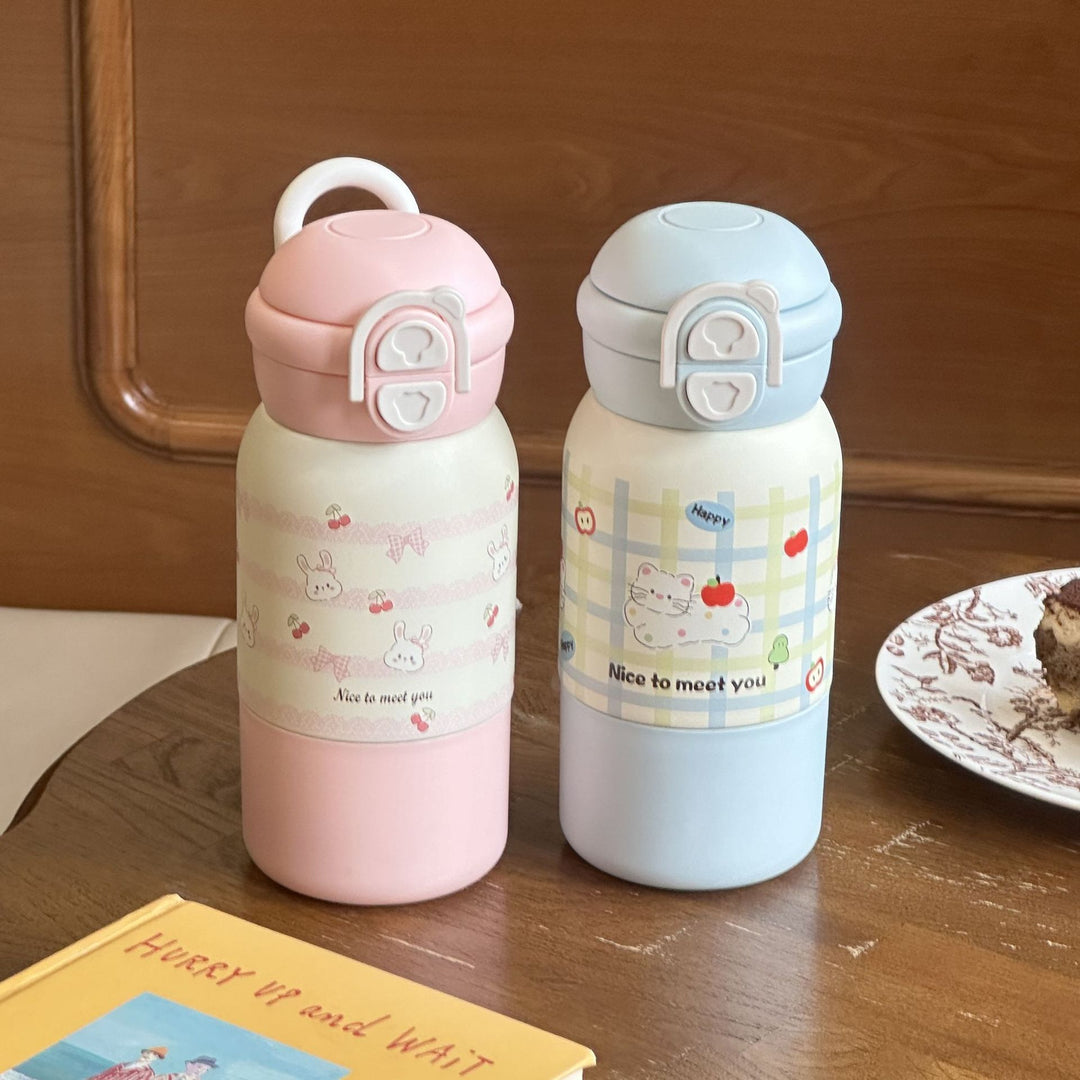 Women's insulated drinking bottle with practical flip lid and cheerful design Bowlift