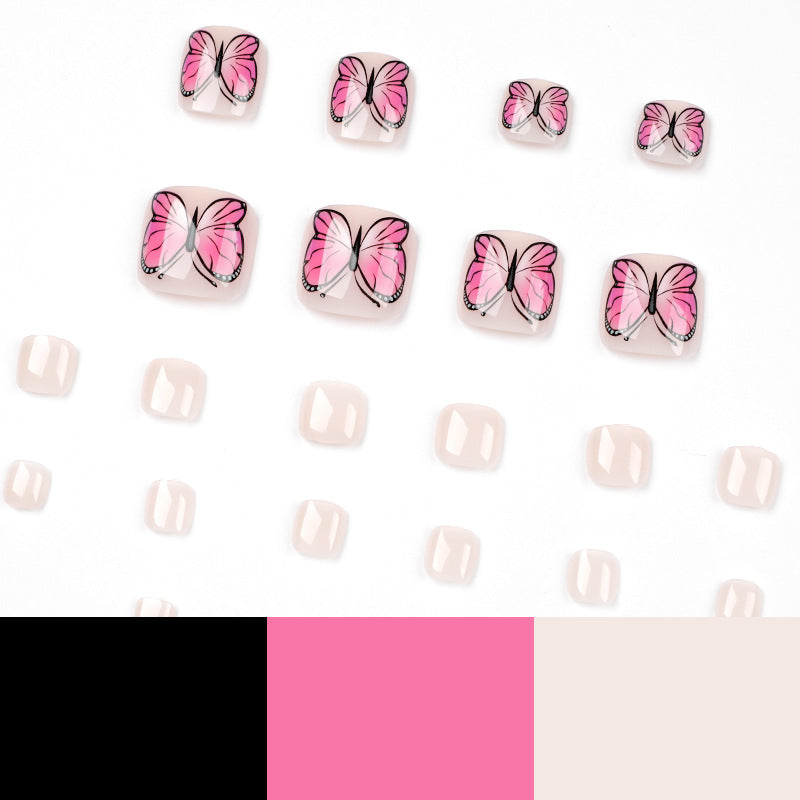 Artful toenail design with butterfly design Bowlift