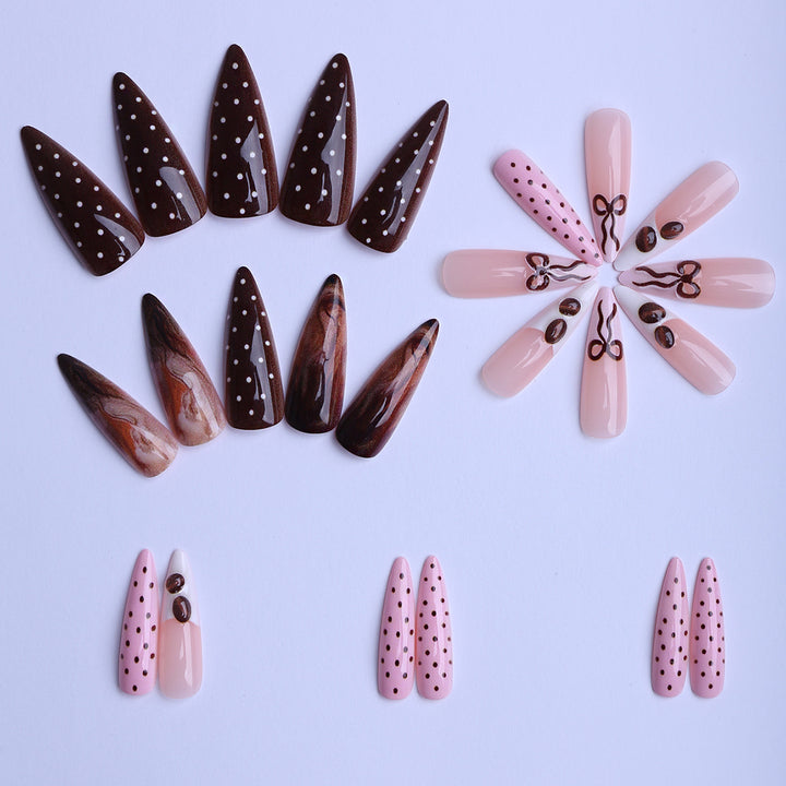 Elegant artificial nails with chocolate motifs and 3D elements Bowlift