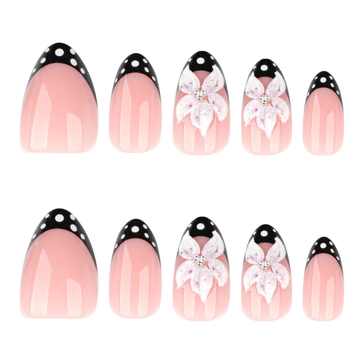 Artistic nail art with floral designs and elegant accents Bowlift