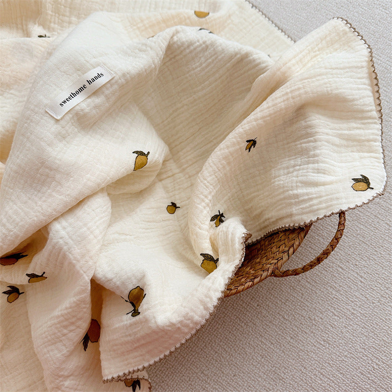 Unisex Muslin Blanket with delicate floral design and elegant ruffles Bowlift