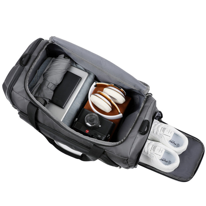 Unisex sporty travel bag with reinforced bottom and ventilation compartments Bowlift