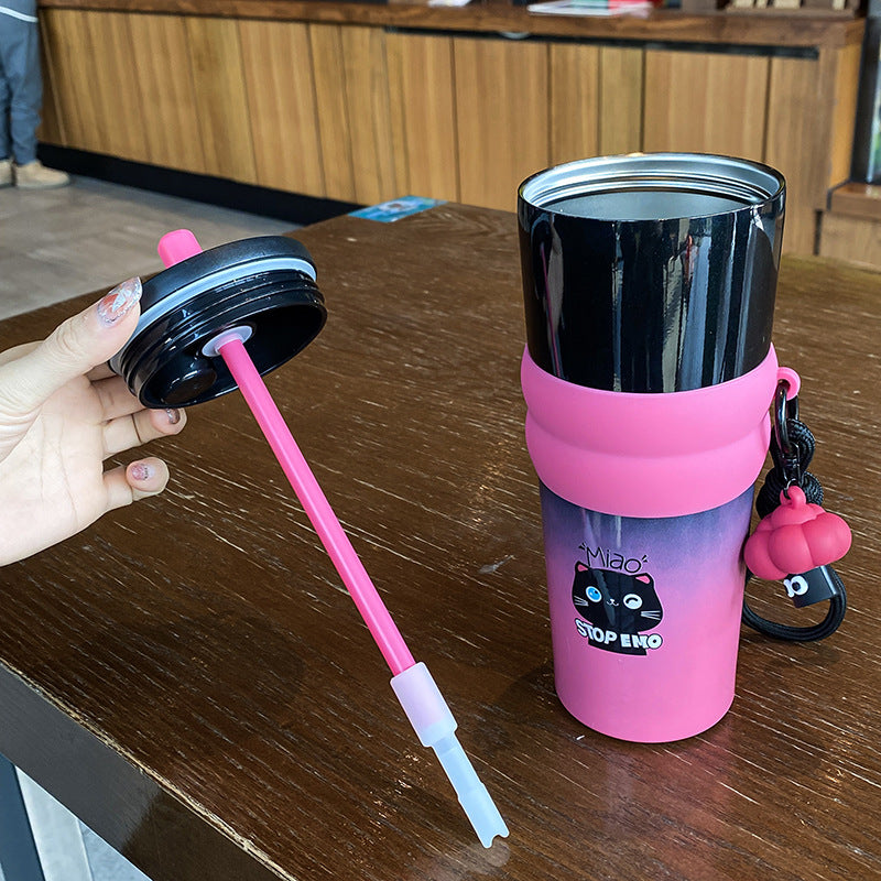 Women's playful coffee mug with silicone sleeve and integrated pendant Bowlift
