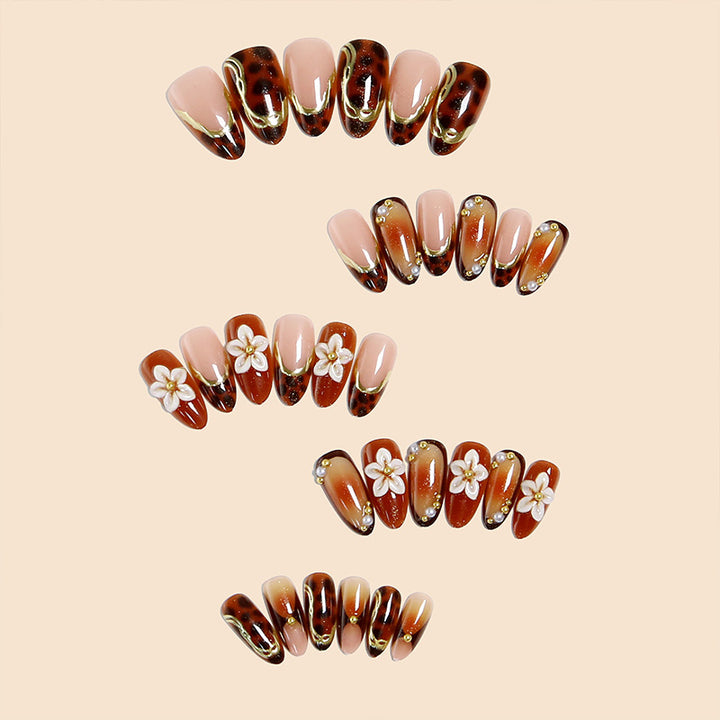 Elegant artificial nails with floral and animal motifs Bowlift