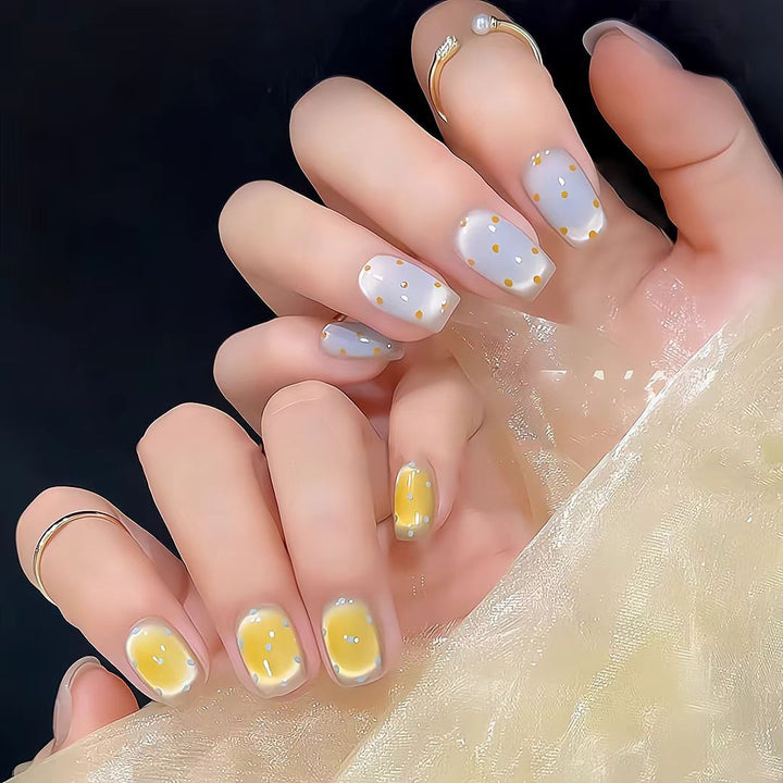 Artistic Press-On Nail Set with Whimsical Dot Designs Bowlift