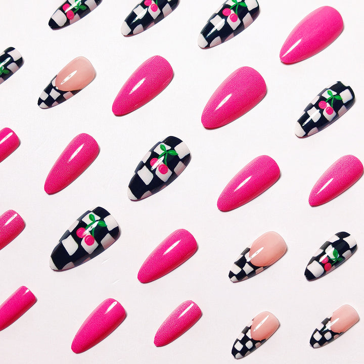 Creative artificial nails with playful cherry and checkerboard design Bowlift