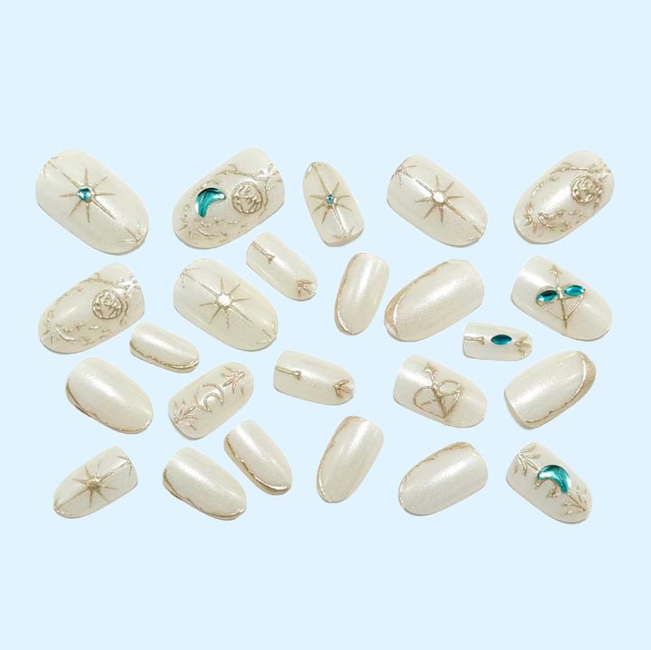 Artificial nails with elegant jewelry embellishments Bowlift