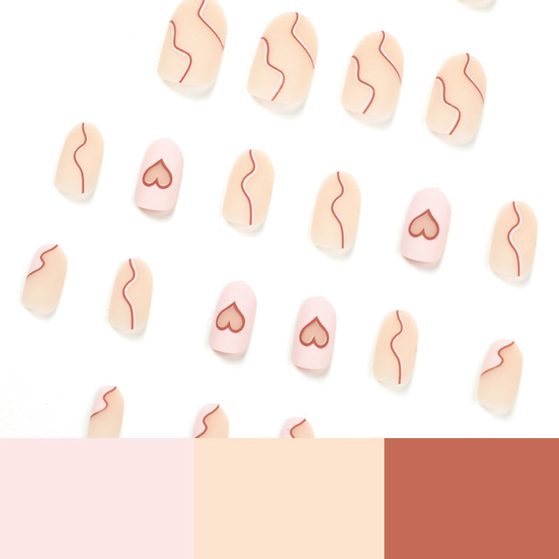Artful Nail Extensions with Elegant Heart Design Bowlift