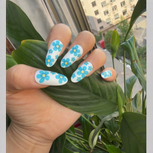 Artistic Almond-Shaped Press-On Nails Set with Metallic Accents Bowlift