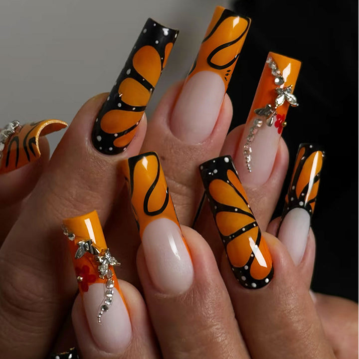 Creative nail set with shimmering floral and geometric designs Bowlift
