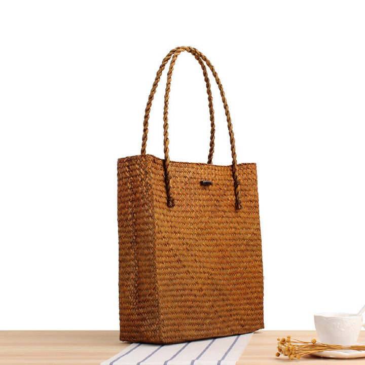 Hand-knotted tote bag made of natural wicker Bowlift
