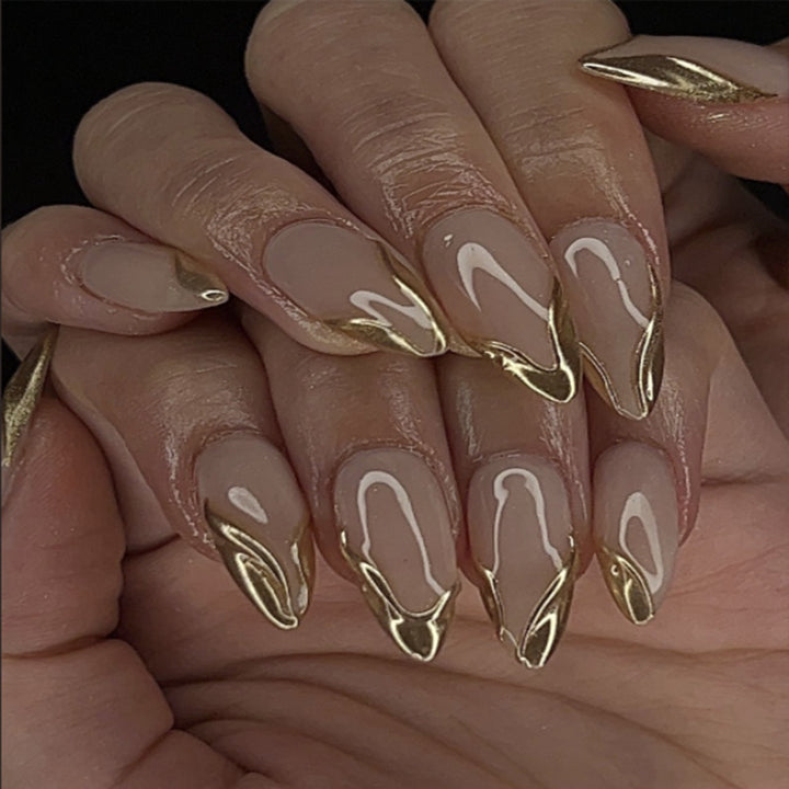 Artistic Stiletto Press-On Nails with Gold Accent Tips Bowlift